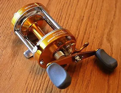 CL60 Gold-Finished Baitcasting Reel for Muskie, Catfish, and Trolling